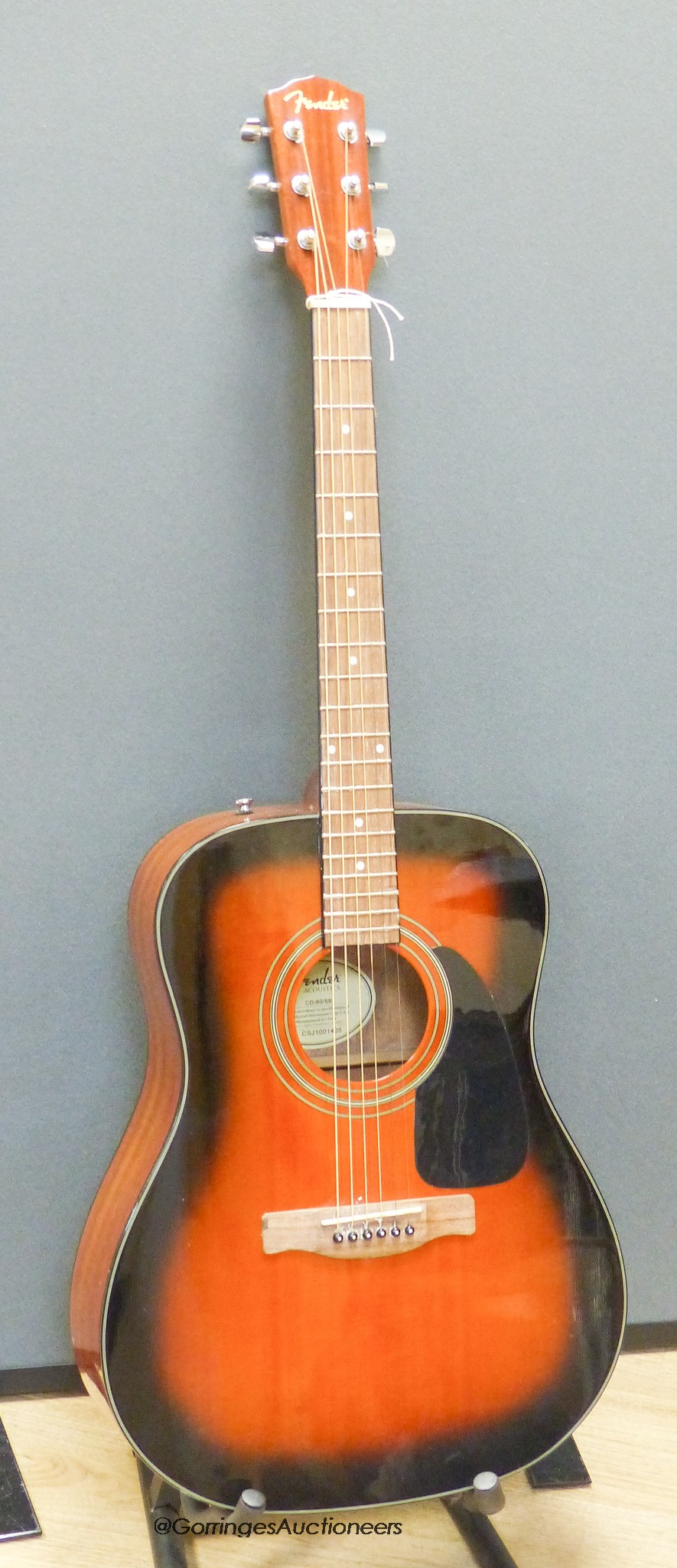 A fender acoustic guitar CD 60/5B